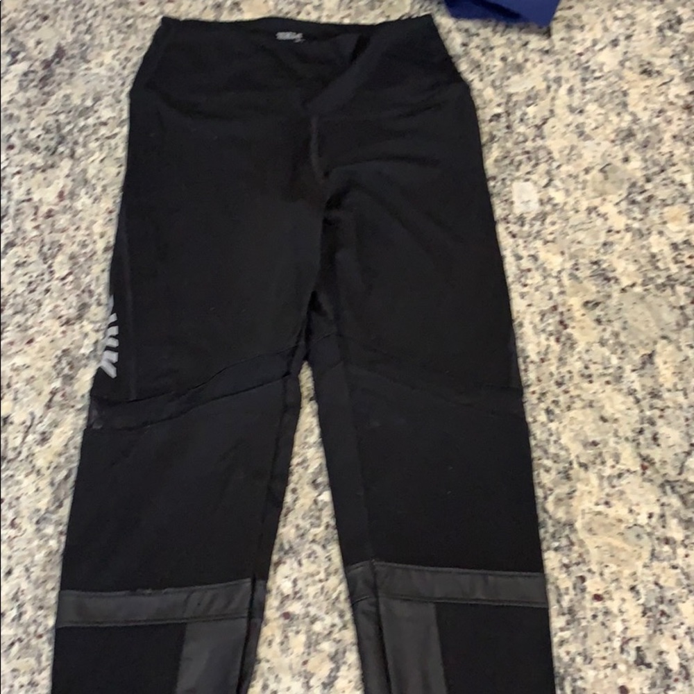 Black leggings with mesh and leather